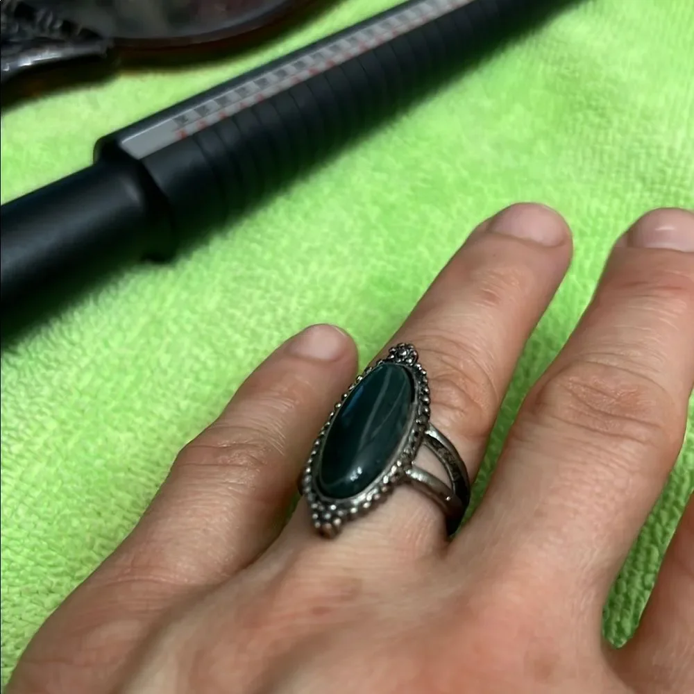 Elegant Silver and Green Oval Ring